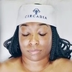 Lady with braids getting facial