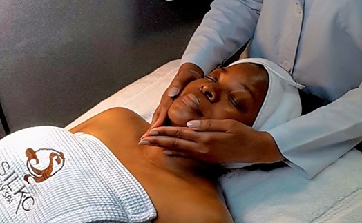 lady receiving facial at silk c day spa
